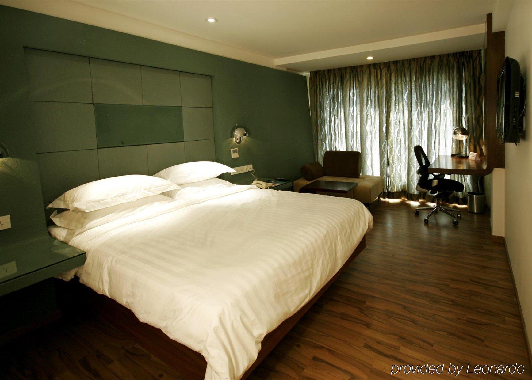 Hotel Trinity Isle Bangalore Zimmer foto